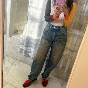 New redone seamed tapered leg split hem jeans